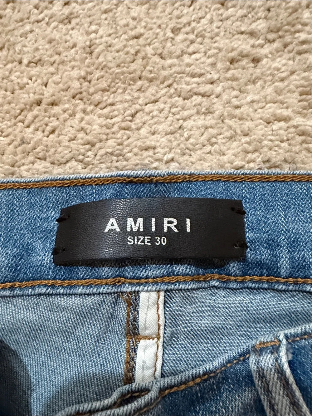 AMIRI Light Blue Slim Straight Jeans with Black Logo Patch